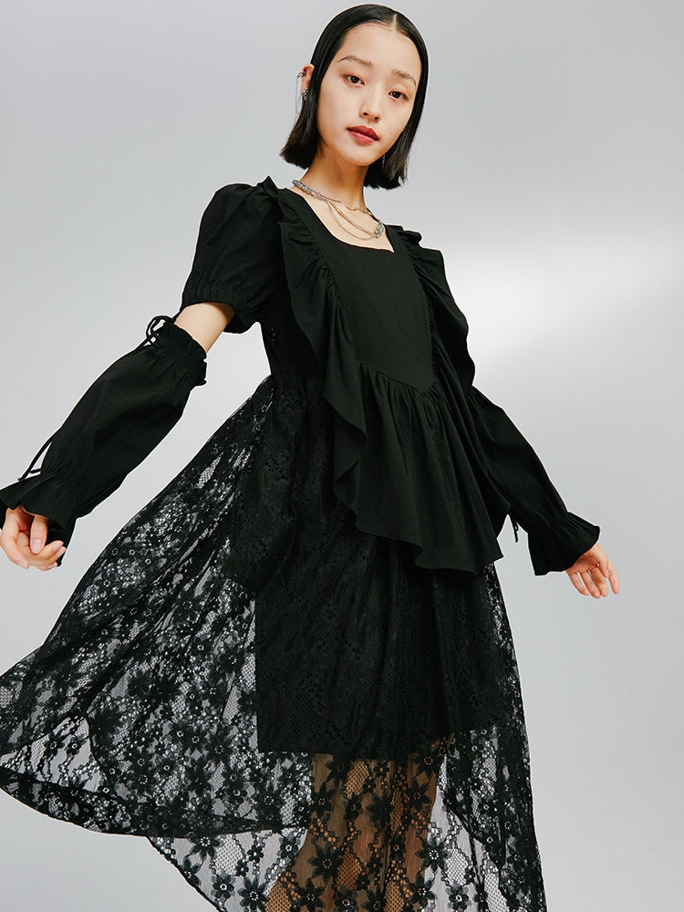 Robe irrégulière noire à manches détachables